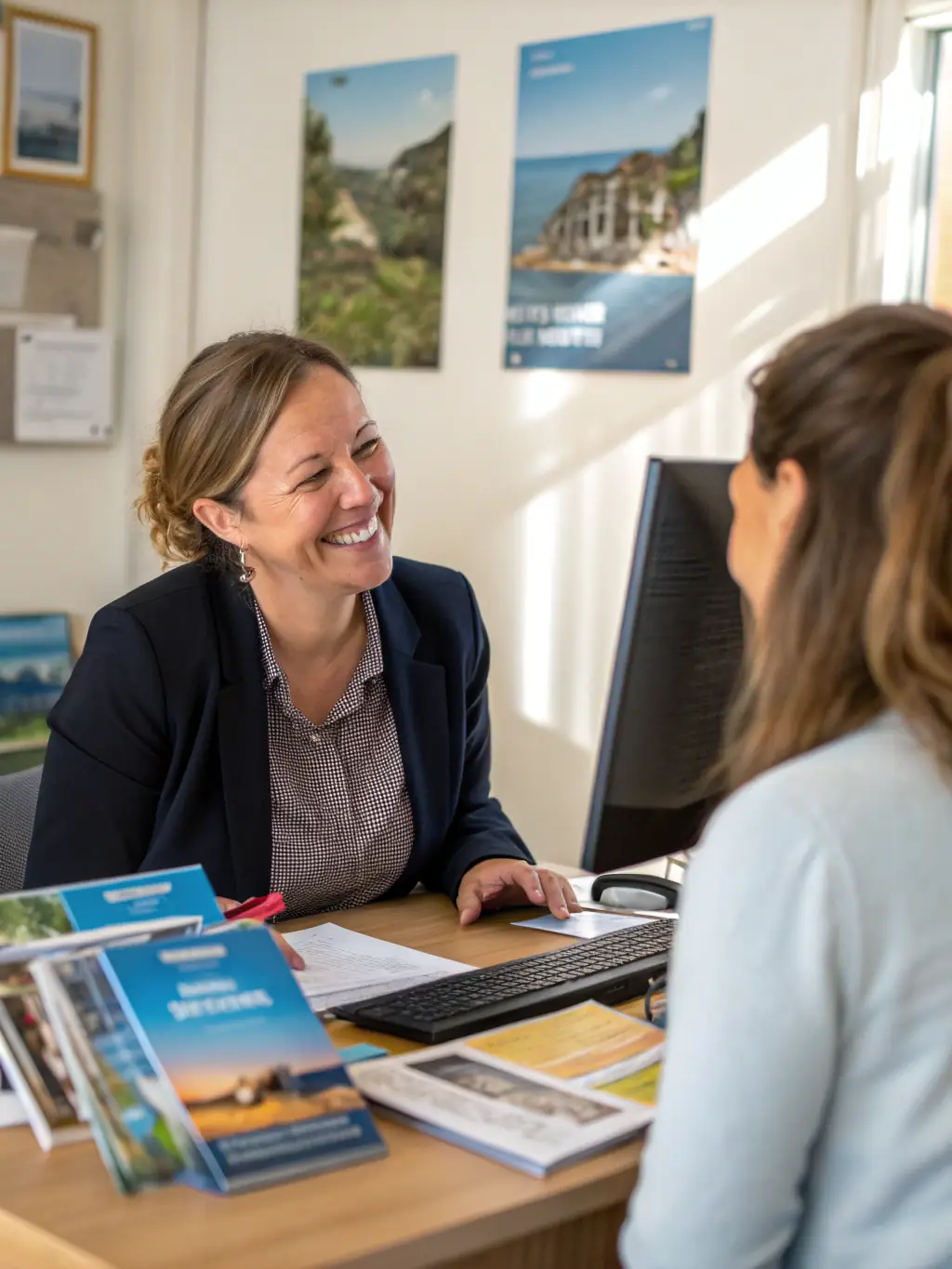 A travel agent consulting with a couple in a modern office, showing personalized service and attention to detail, reflecting Omterra Travel’s customer support.